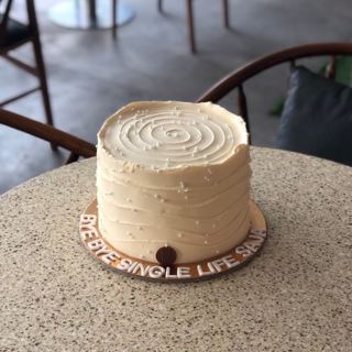 Ivory cake with soft ridged buttercream and pearls, by DOT Cake Art