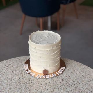 Light grey ridged cake with pearl sprinkles, by DOT Cake Art