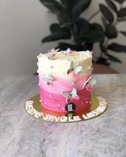 White and pink cake with colorful butterflies, bye-bye single life, by DOT Cake Art