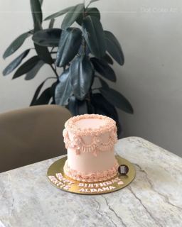 Small pink cake with vintage piped frosting, by DOT Cake Art