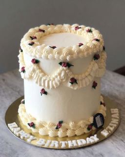 White vintage piped cake with tiny roses, by DOT Cake Art
