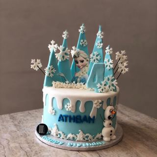 Blue Frozen cake with ice castle, Elsa and Olaf, by DOT Cake Art
