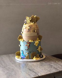 Two-tier Winnie the Pooh honeycomb cake with bees, by DOT Cake Art