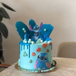 Blue Stitch cake with red hearts, by DOT Cake Art