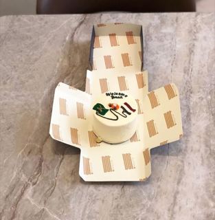 Small white cake with travel doodle, welcome back, by DOT Cake Art