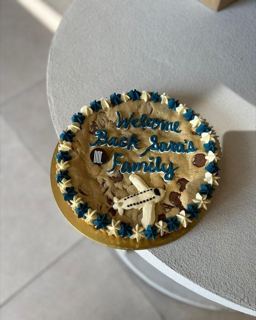 Giant cookie cake with plane, welcome back, by DOT Cake Art