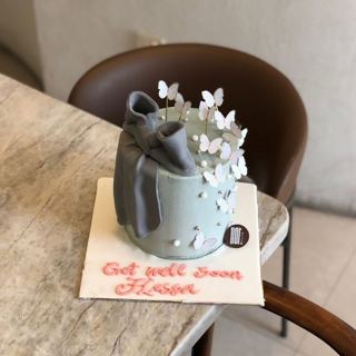 Grey cake with bow and white butterflies, get well soon, by DOT Cake Art