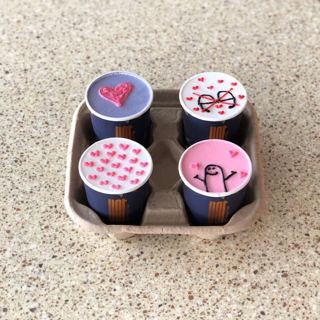 Four pink and blue cup cakes with hearts, by DOT Cake Art