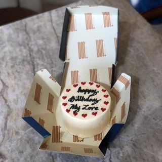 Small white cake with red hearts for a loved one, by DOT Cake Art