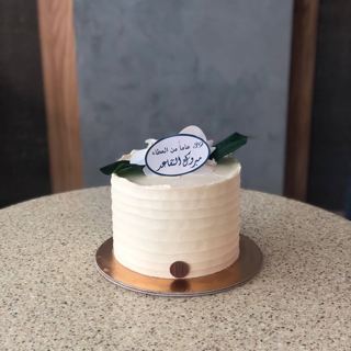 DOT Cake Art 出品：简约白色蛋糕，绿叶与退休祝福卡