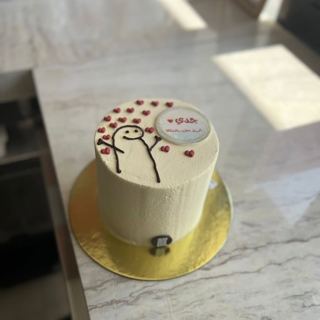Small white cake with Flork character and hearts, by DOT Cake Art