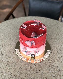 Red and pink cake with butterflies, by DOT Cake Art