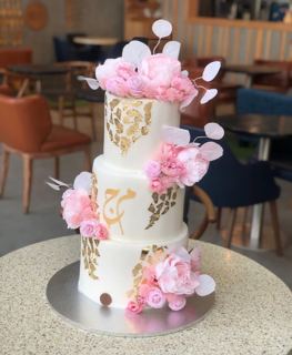 Three-tier white and gold cake with pink flowers, by DOT Cake Art
