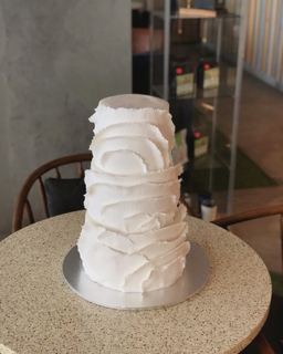 White cake with wrapped layers, by DOT Cake Art